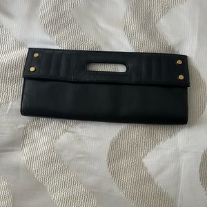 Cleo & Patek leather clutch